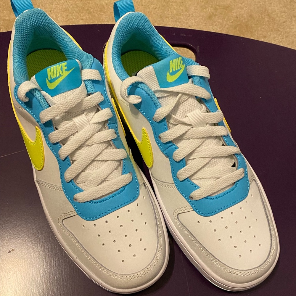 Nike Blue and white. New never worn without a box 5.5 boy or 7 ladies